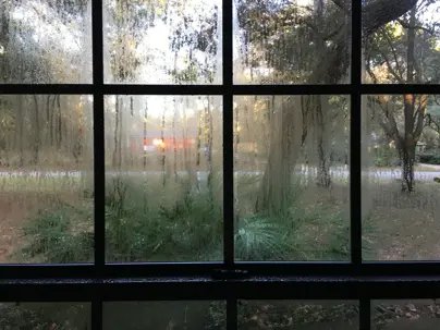 heavy condensation on a window interior